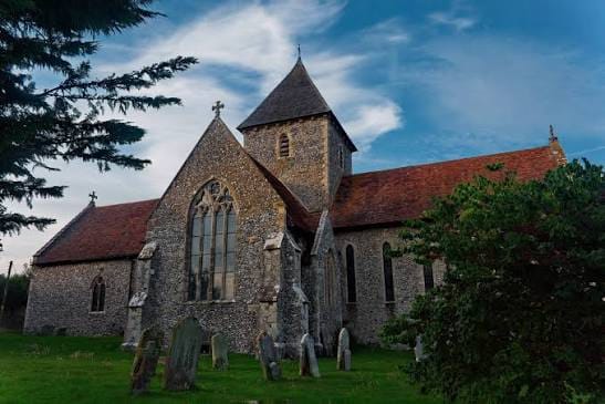 An image of the pretty church and tower at Adisham, near Canterbury, Kent