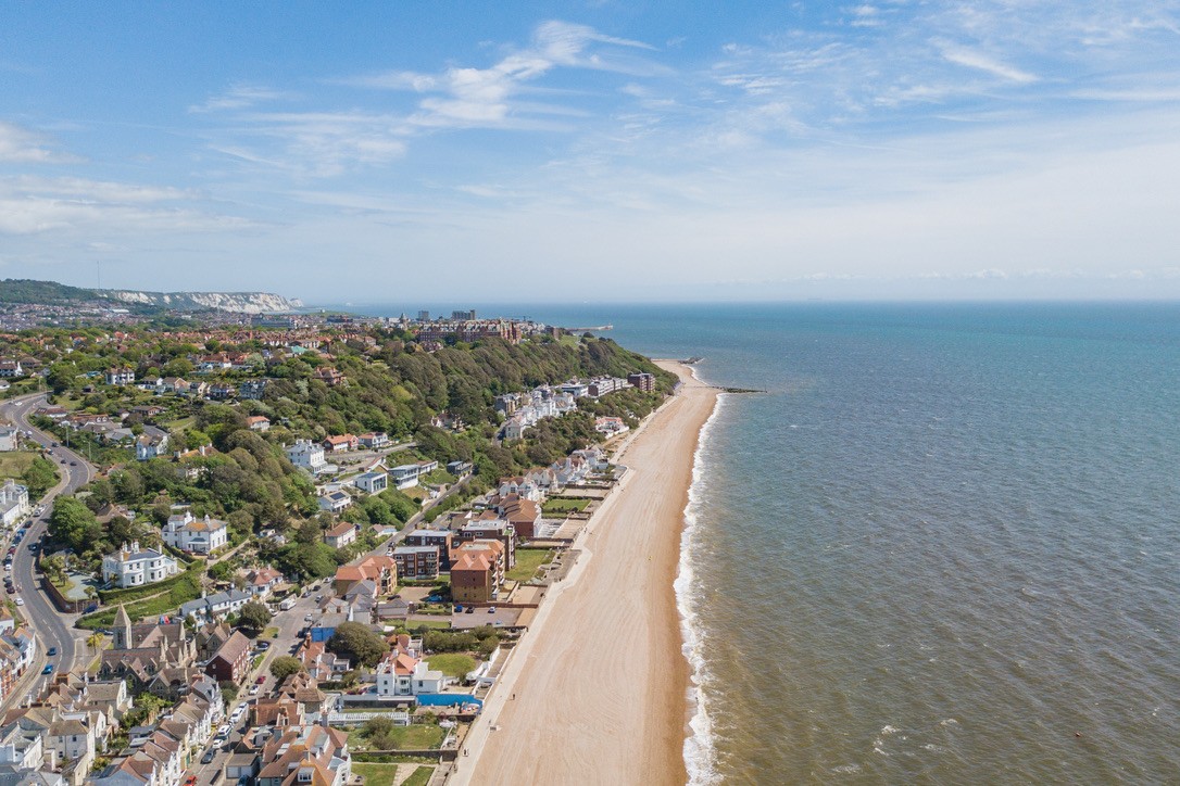 Aerial beach shot over Sandgate's shingle beach, in Kent