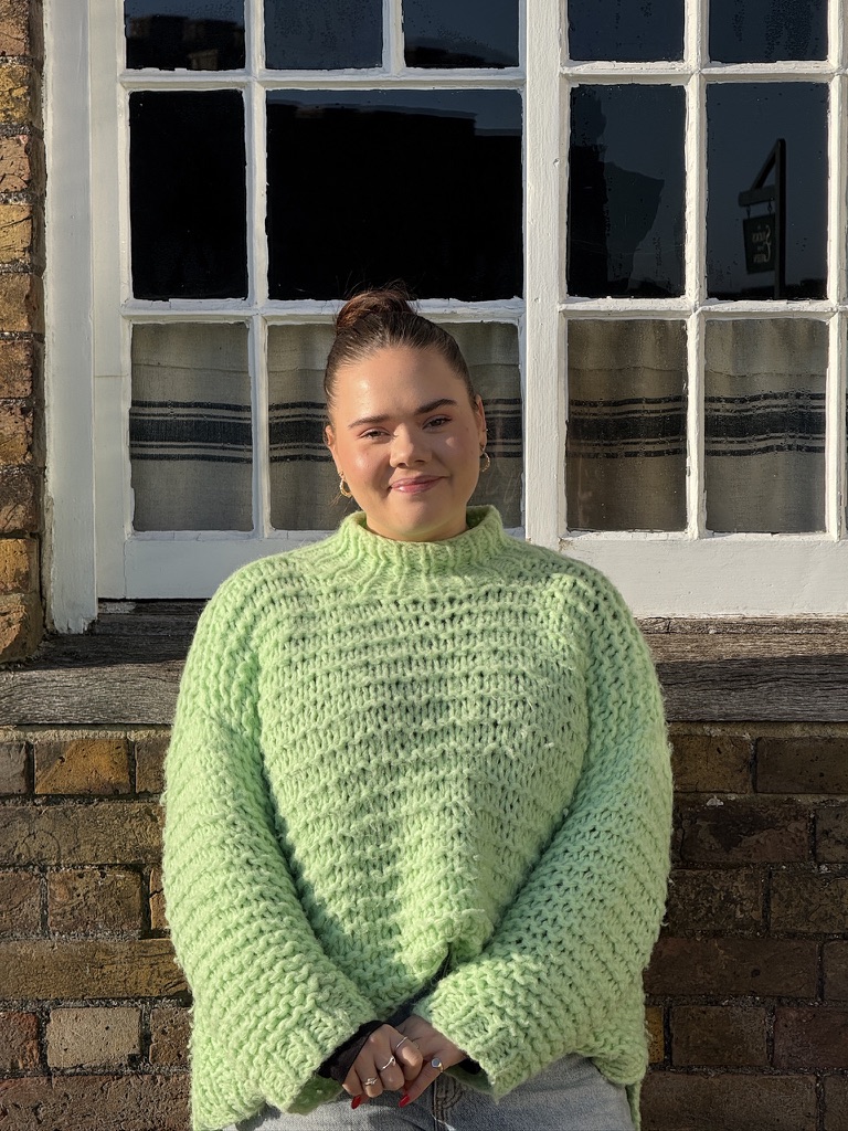 Tallulah, accounts executive, outside Keepers Cottages Deal office