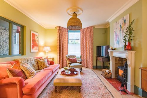 An image of a beautifully decorated living room in a period property