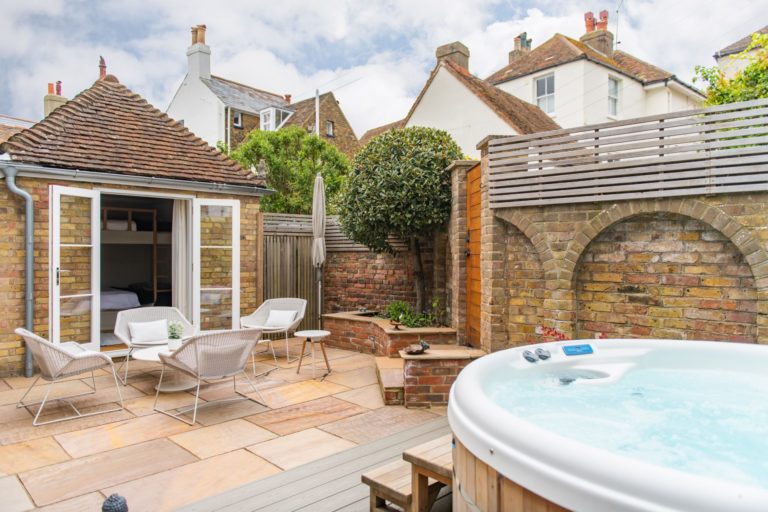 hot tub and terrace area of The Hide, a Deal holiday cottage
