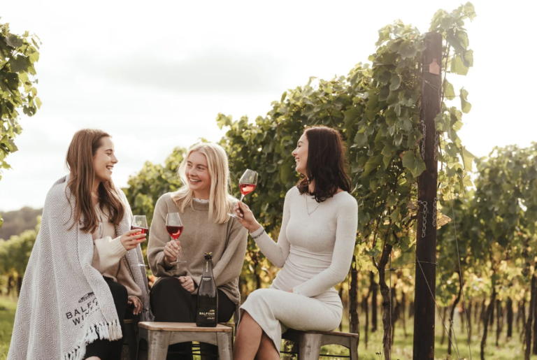 Three women enjoying a tasting experience at the Balfour Winery, Kent